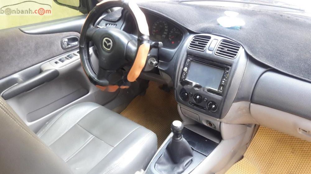 Mazda 323 Classic GLX 2004 - Bán gấp Mazda 323 Classic GLX sản xuất năm 2004, màu đen  