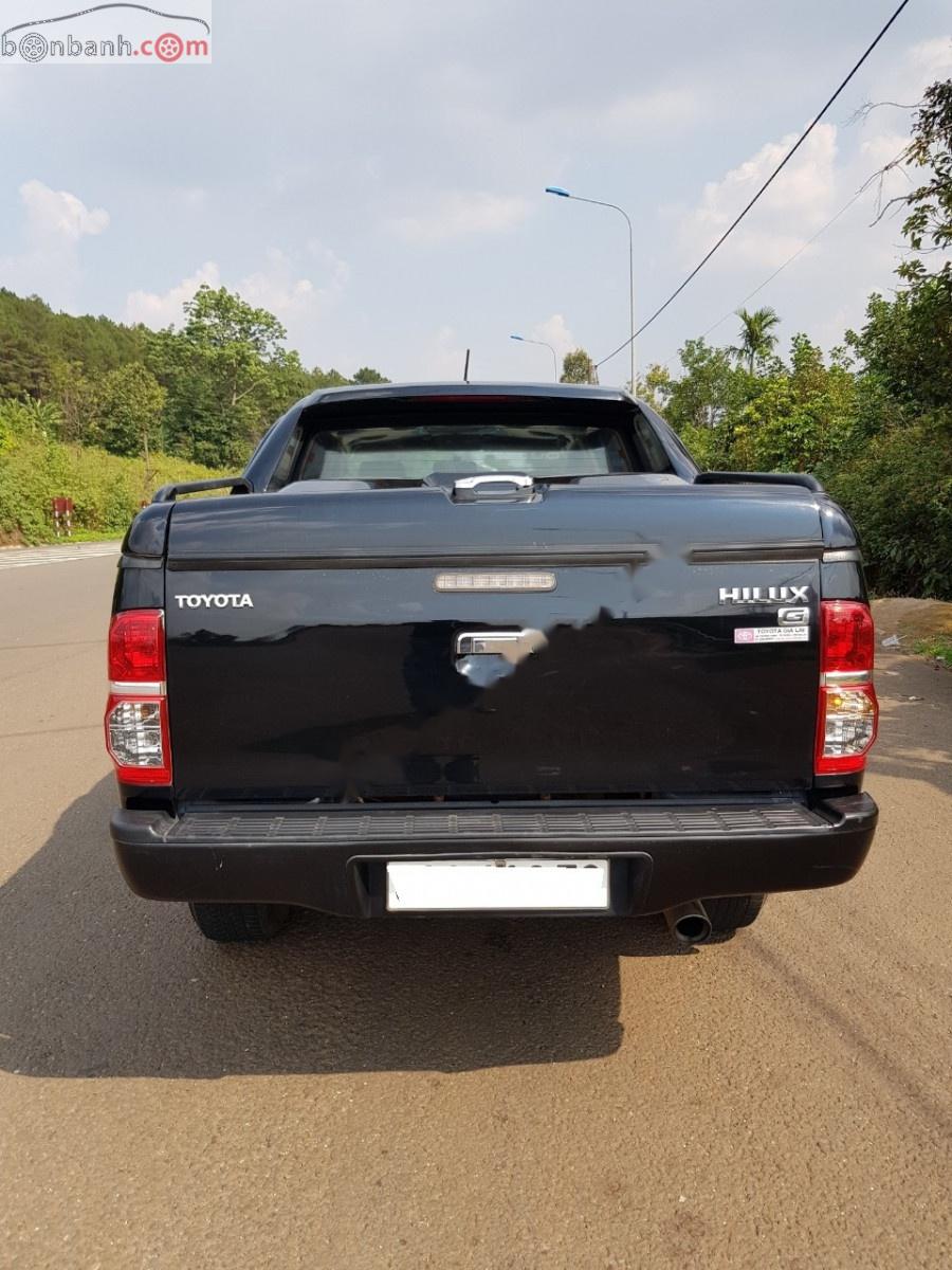 Toyota Hilux 3.0G 4x4 MT 2014 - Cần bán Toyota Hilux 3.0G 4x4 MT năm 2014, màu đen, nhập khẩu nguyên chiếc 