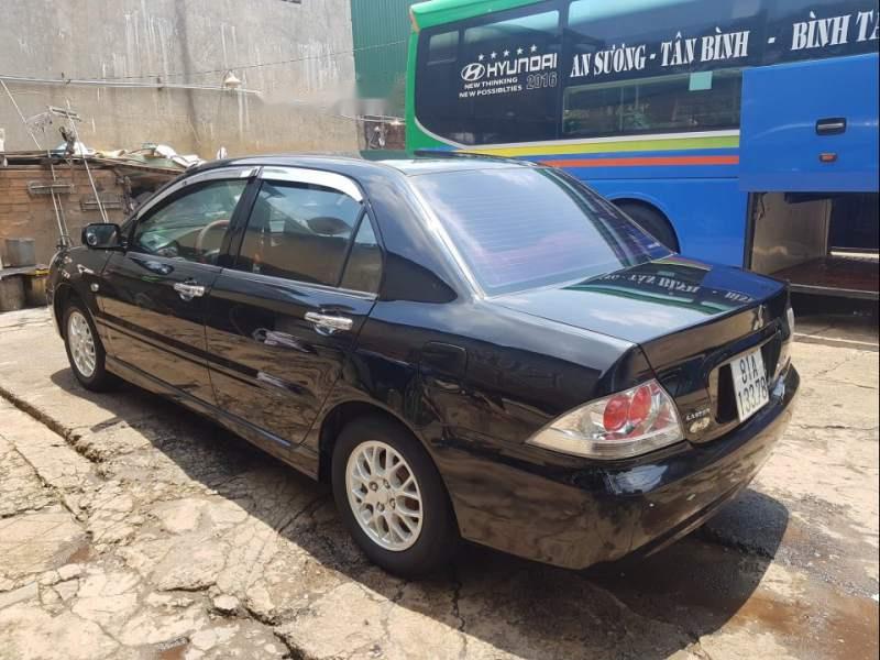 Mitsubishi Lancer GLX 1.6 AT 2003 - Cần bán gấp Mitsubishi Lancer GLX 1.6 AT năm sản xuất 2003, màu đen chính chủ  