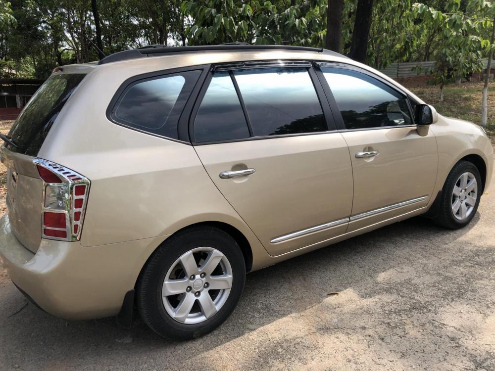 Kia Carens   2007 - Cần bán Kia Carens 7 chỗ, xe gia đình sử dụng, nhập khẩu, năm sản xuất 2007, màu vàng 