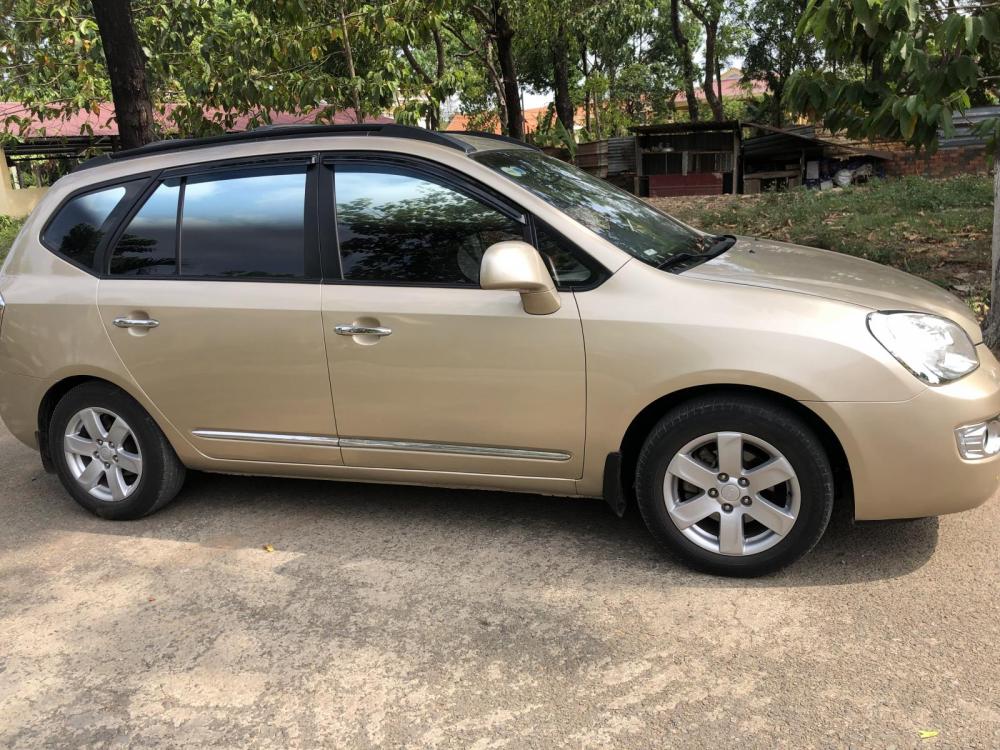 Kia Carens   2007 - Cần bán Kia Carens 7 chỗ, xe gia đình sử dụng, nhập khẩu, năm sản xuất 2007, màu vàng 