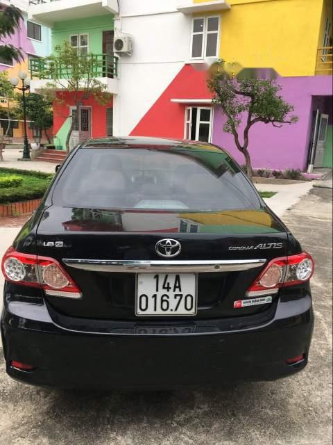 Toyota Corolla altis  MT  2011 - Bán gấp Toyota Corolla altis MT sản xuất 2011, màu đen, số sàn