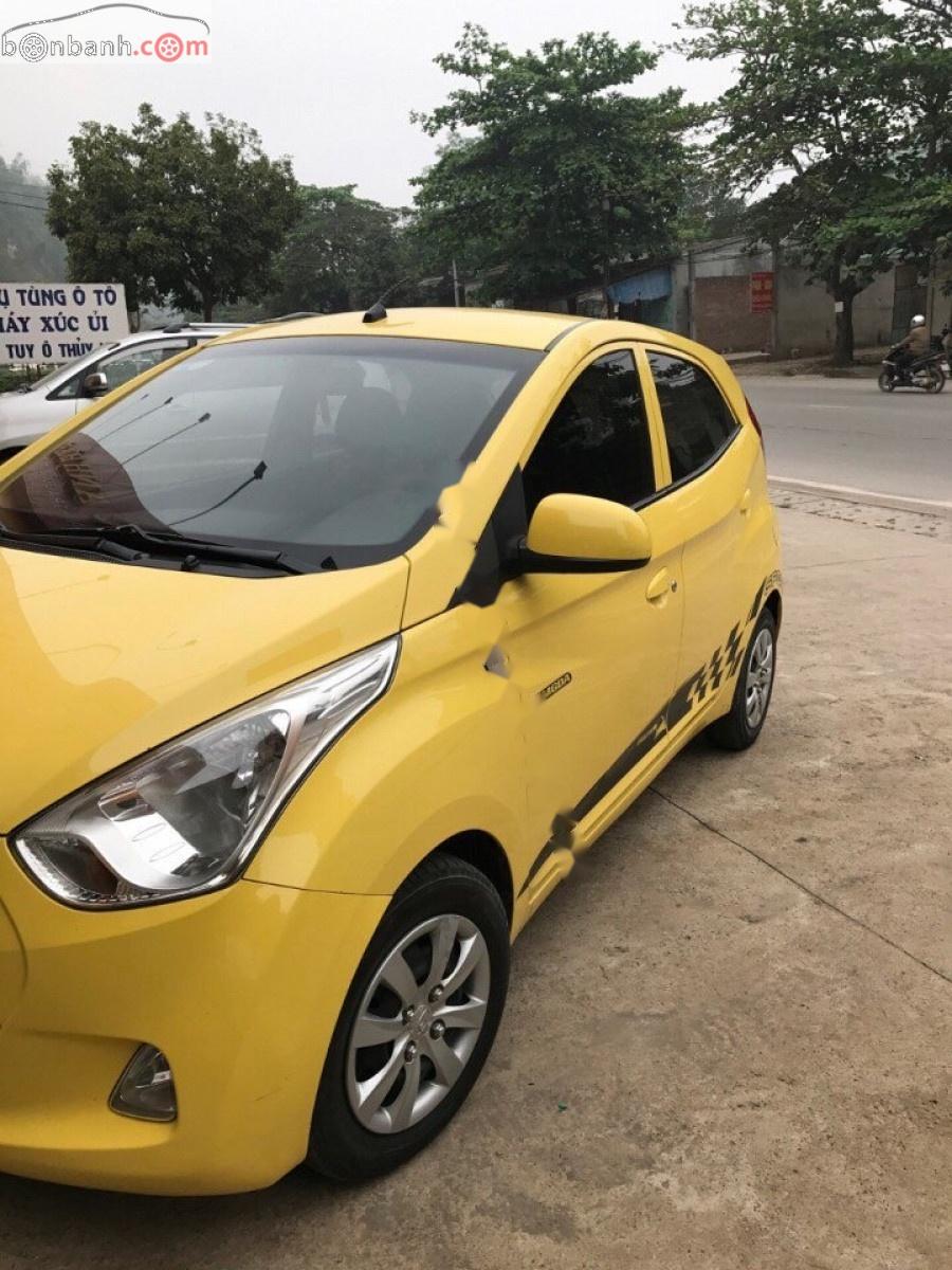 Hyundai Eon 2012 - Cần bán gấp Hyundai Eon đời 2012, màu vàng, nhập khẩu, Đk lần đầu 2014