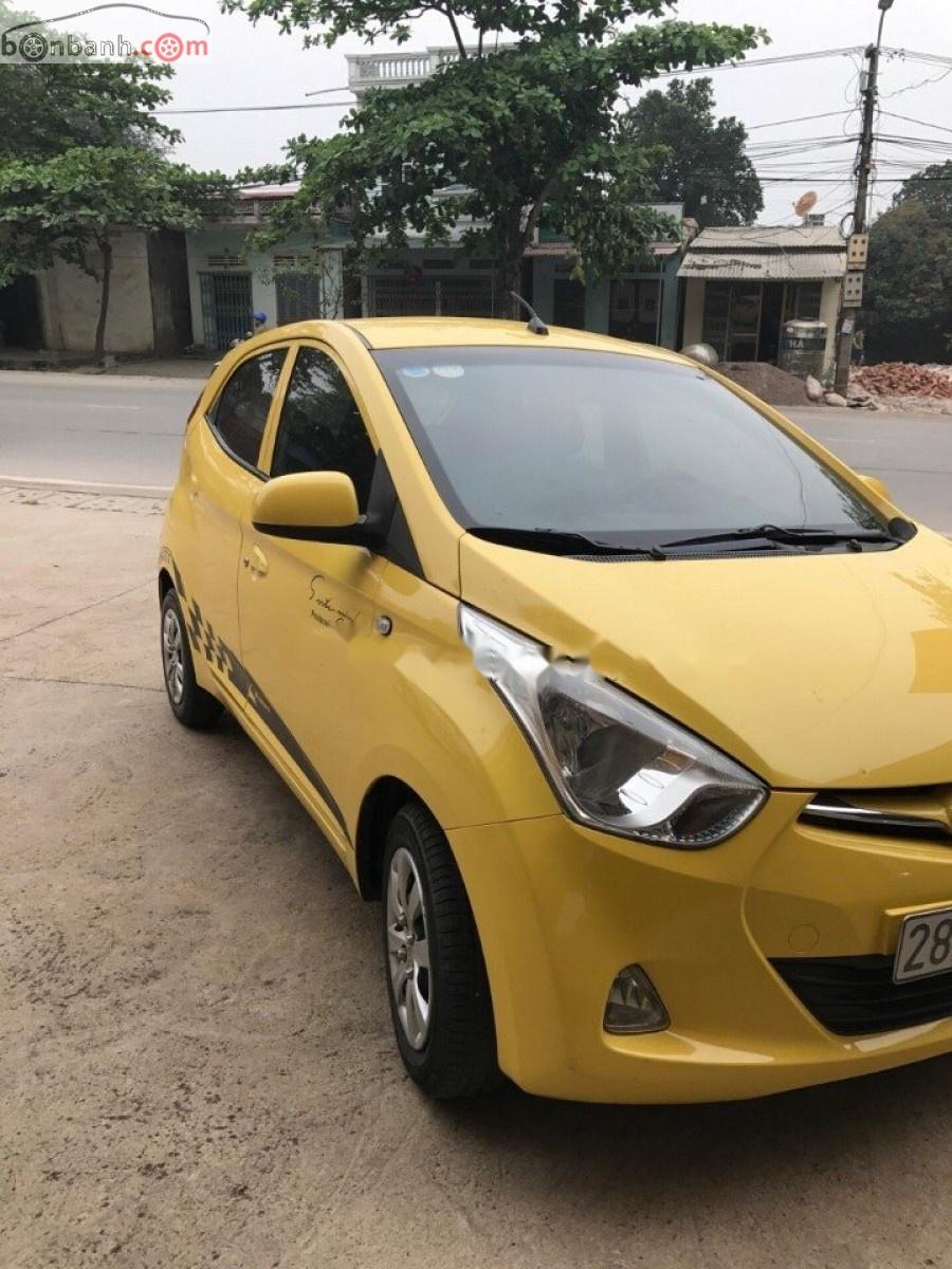 Hyundai Eon 2012 - Cần bán gấp Hyundai Eon đời 2012, màu vàng, nhập khẩu, Đk lần đầu 2014