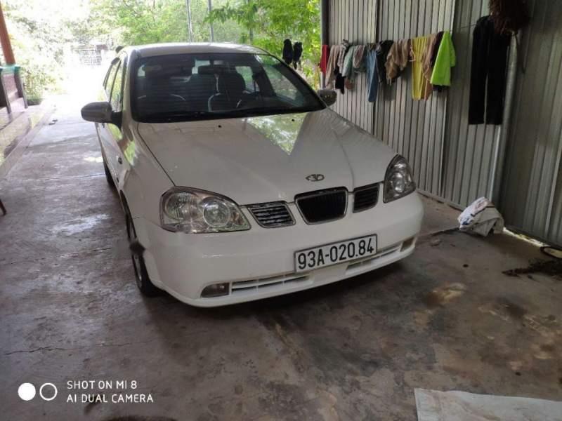 Daewoo Lacetti MT 2005 - Bán Daewoo Lacetti MT năm 2005, màu trắng, xe nhập 