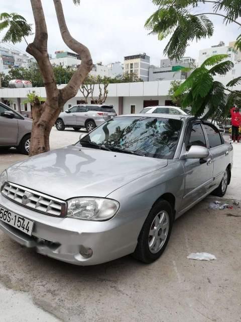 Kia Spectra   2006 - Bán xe Kia Spectra sản xuất năm 2006, màu bạc, xe đồng sơn mới keng