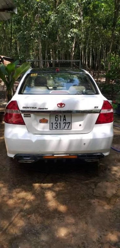 Daewoo Gentra MT 2010 - Bán ô tô Daewoo Gentra MT sản xuất 2010, màu trắng, nhập khẩu, nhiều đồ zin