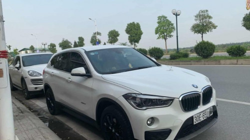 BMW X1   1.8 AT  2016 - Xe BMW X1 1.8 AT đời 2016, màu trắng, nhập khẩu nguyên chiếc