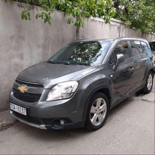 Chevrolet Orlando MT 2012 - Cần bán gấp Chevrolet Orlando MT năm sản xuất 2012, màu xám, xem xe thương lượng