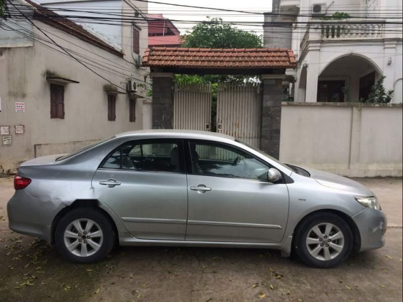 Toyota Corolla altis 1.8G AT 2009 - Bán Toyota Corolla altis 1.8G AT sản xuất 2009, màu bạc số tự động