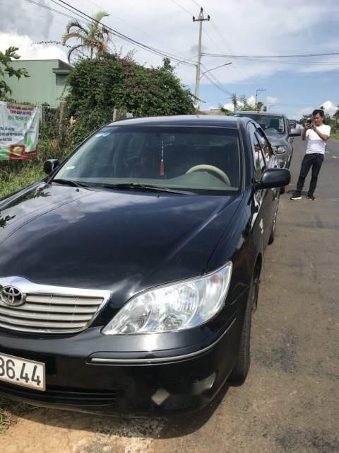 Toyota Camry   2004 - Bán Toyota Camry năm 2004, màu đen số sàn, giá 299tr