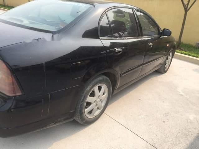 Daewoo Magnus 2005 - Bán Daewoo Magnus năm 2005, màu đen còn mới