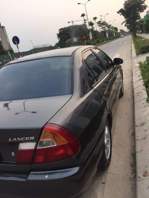 Mitsubishi Lancer   2001 - Bán Mitsubishi Lancer 2001, màu đen xe gia đình, giá chỉ 120 triệu