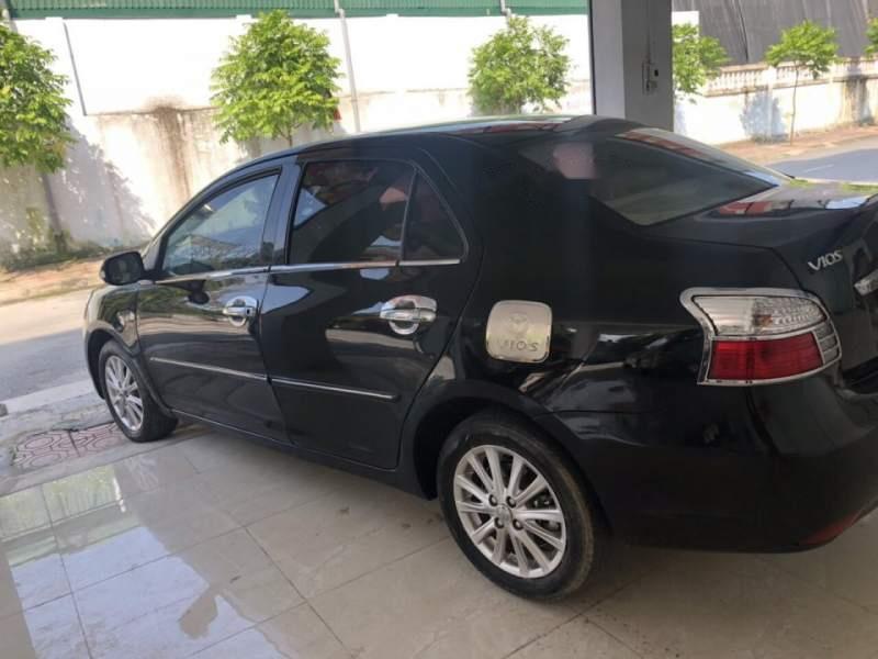 Toyota Vios  E   2010 - Bán xe Toyota Vios E năm 2010, màu đen