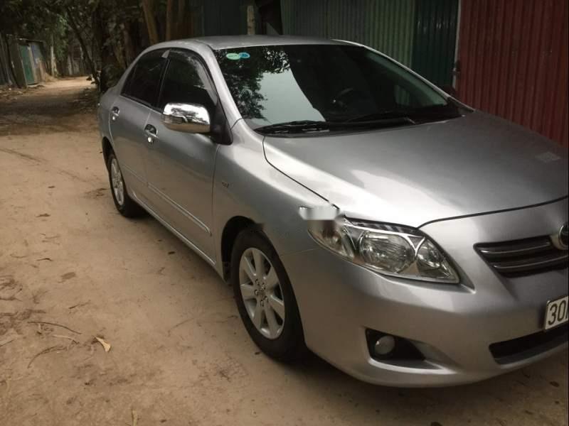 Toyota Corolla altis 2010 - Bán xe Toyota Corolla altis sản xuất 2010, màu bạc chính chủ