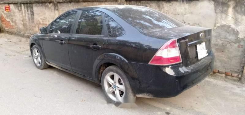 Ford Focus   2010 - Bán ô tô Ford Focus đời 2010, màu đen số sàn