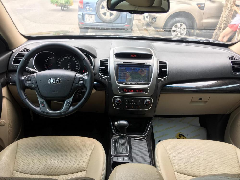 Kia Sedona 2.4 AT  2016 - Cần bán Kia Sedona 2.4 AT đời 2016, màu nâu, 715 triệu