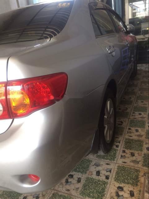 Toyota Corolla altis 2009 - Cần bán gấp Toyota Corolla altis đời 2009, màu bạc như mới