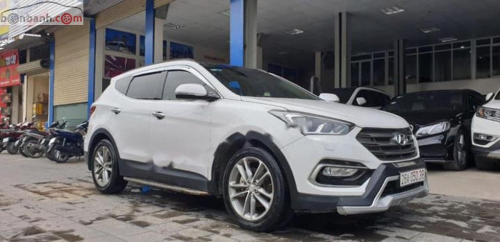 Hyundai Santa Fe 2.2L 4WD 2016 - Cần bán lại xe Hyundai Santa Fe 2.2L 4WD đời 2016, màu bạc như mới