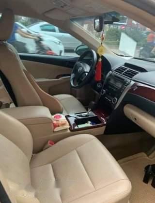 Toyota Camry   2.0E 2015 - Chính chủ bán xe Toyota Camry 2.0E đời 2015, màu vàng cát