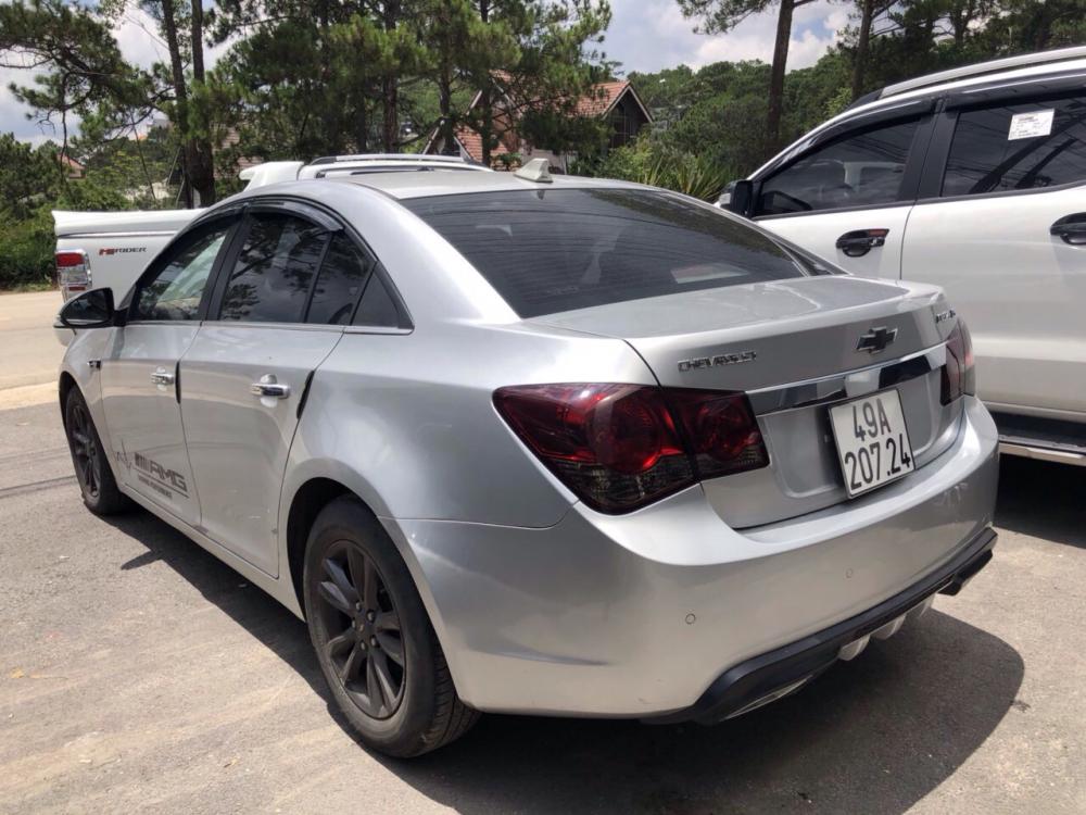 Chevrolet Cruze MT 2015 - Ban xe Cruze MT 2015, màu đen, 379tr