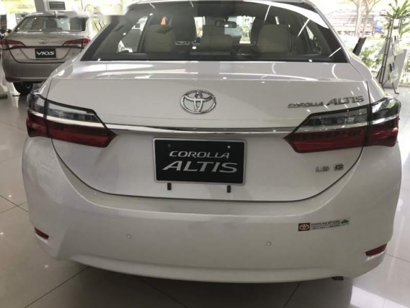 Toyota Corolla altis 2019 - Bán Toyota Corolla altis sản xuất năm 2019, màu trắng, giao xe ngay