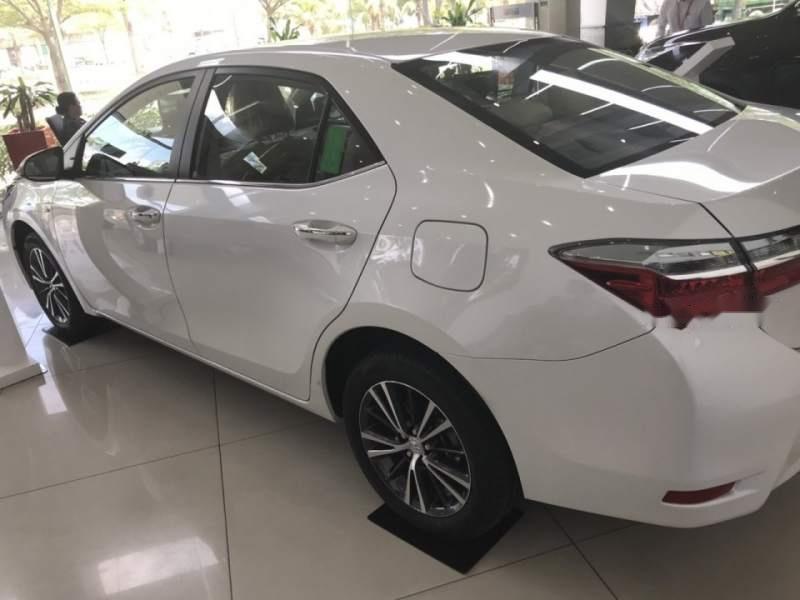 Toyota Corolla altis 2019 - Bán Toyota Corolla altis sản xuất năm 2019, màu trắng, giao xe ngay