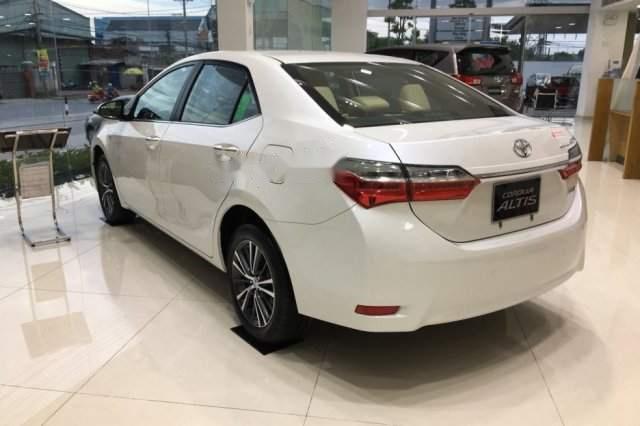 Toyota Corolla altis 2019 - Bán Toyota Corolla Altis đời 2019, màu trắng, 730 triệu
