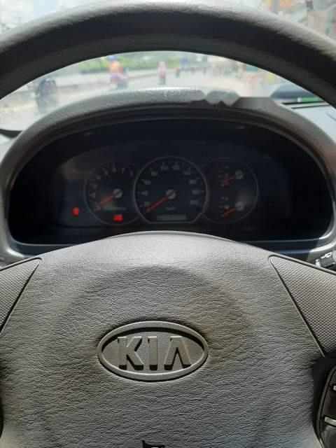 Kia Carnival 2005 - Bán xe Kia Carnival đời 2005, màu đen