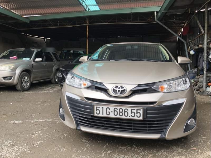 Toyota Vios 1.5AT 2018 - Bán xe Toyota Vios 1.5AT sản xuất năm 2018, màu vàng số tự động