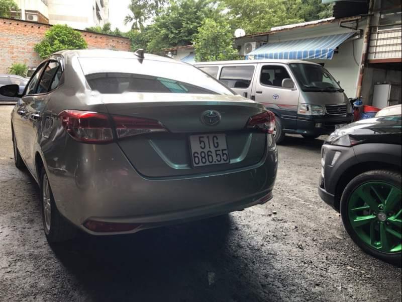 Toyota Vios 1.5AT 2018 - Bán xe Toyota Vios 1.5AT sản xuất năm 2018, màu vàng số tự động