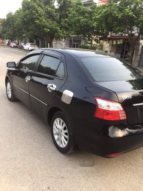 Toyota Vios 1.5E 2011 - Bán Toyota Vios 1.5E năm 2011, màu đen chính chủ