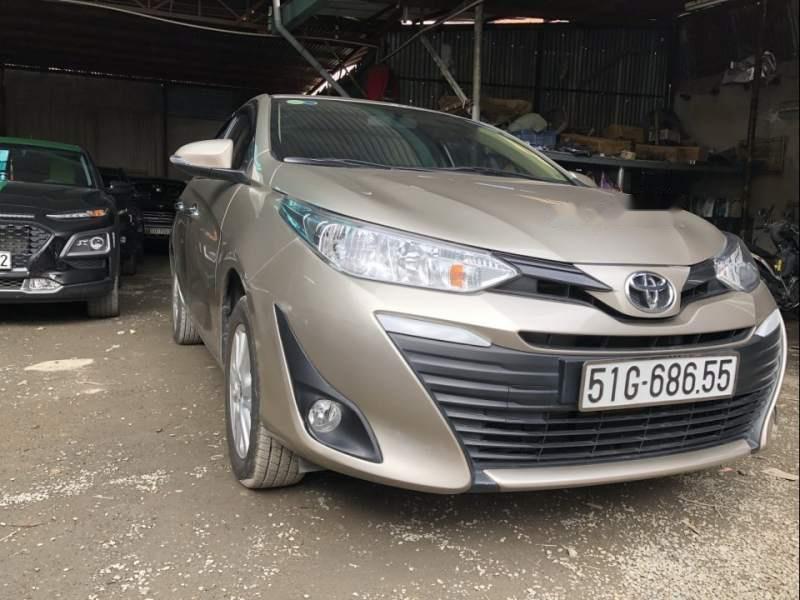 Toyota Vios 1.5AT 2018 - Bán xe Toyota Vios 1.5AT sản xuất năm 2018, màu vàng số tự động