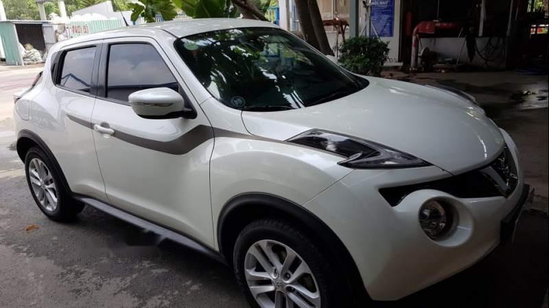 Nissan Juke 2015 - Cần bán gấp Nissan Juke sản xuất năm 2015, màu trắng đẹp như mới, 745 triệu