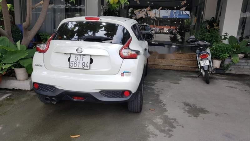 Nissan Juke 2015 - Cần bán gấp Nissan Juke sản xuất năm 2015, màu trắng đẹp như mới, 745 triệu