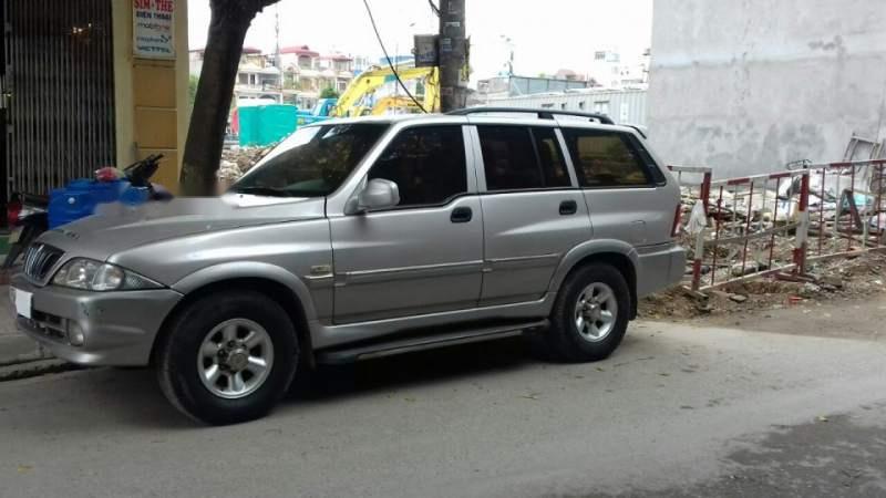 Ssangyong Musso 2.4AT 2004 - Cần bán xe Ssangyong Musso 2.4AT 2004, màu bạc