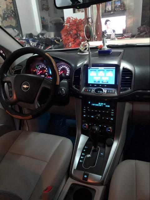 Chevrolet Captiva LTZ 2015 - Cần bán Chevrolet Captiva LTZ sản xuất năm 2015, màu trắng xe gia đình