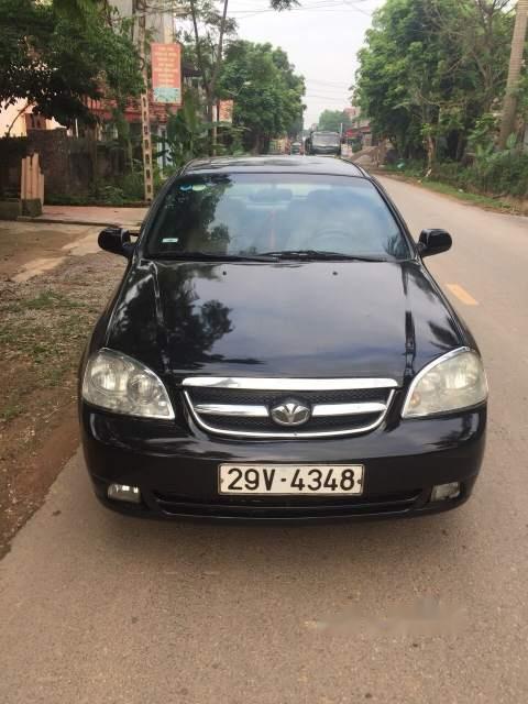 Daewoo Lacetti    MT 2004 - Cần bán gấp Daewoo Lacetti MT năm 2004, màu đen, xe rất đẹp