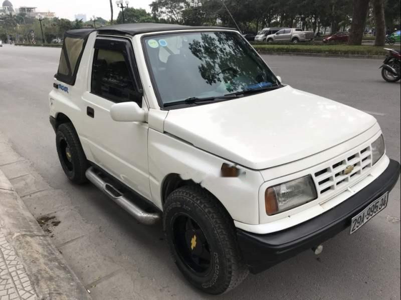 Chevrolet Tracker   1991 - Cần bán xe Chevrolet Tracker sản xuất 1991, màu trắng, số sàn hai cầu