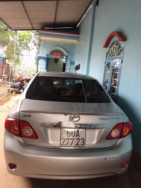 Toyota Corolla altis   2009 - Bán Toyota Corolla Altis năm sản xuất 2009, màu bạc, xe nhập, đồ còn zin nguyên