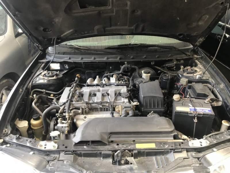 Mazda 626 2004 - Bán xe Mazda 626 đời 2004, màu đen, còn rất chất