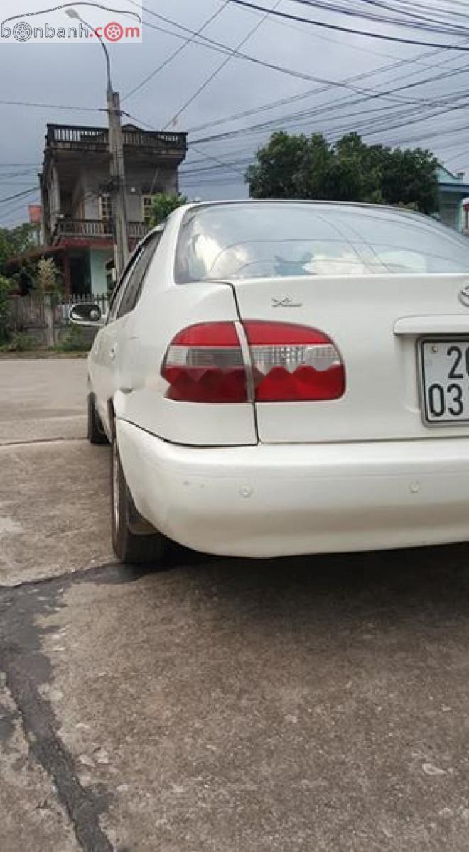 Toyota Corolla XL 1.3 MT 2000 - Bán Toyota Corolla màu trắng, đời 2000