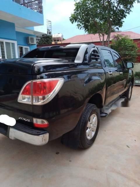 Mazda BT 50 2.2 MT  2015 - Cần bán xe Mazda BT 50 2.2 MT đời 2015, màu đen số sàn