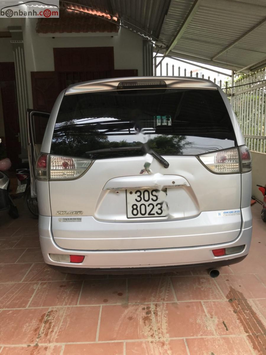 Mitsubishi Zinger GLS 2.4 MT 2009 - Bán xe Zinger Sx 2009, số tay, máy xăng, màu bạc, nội thất màu kem