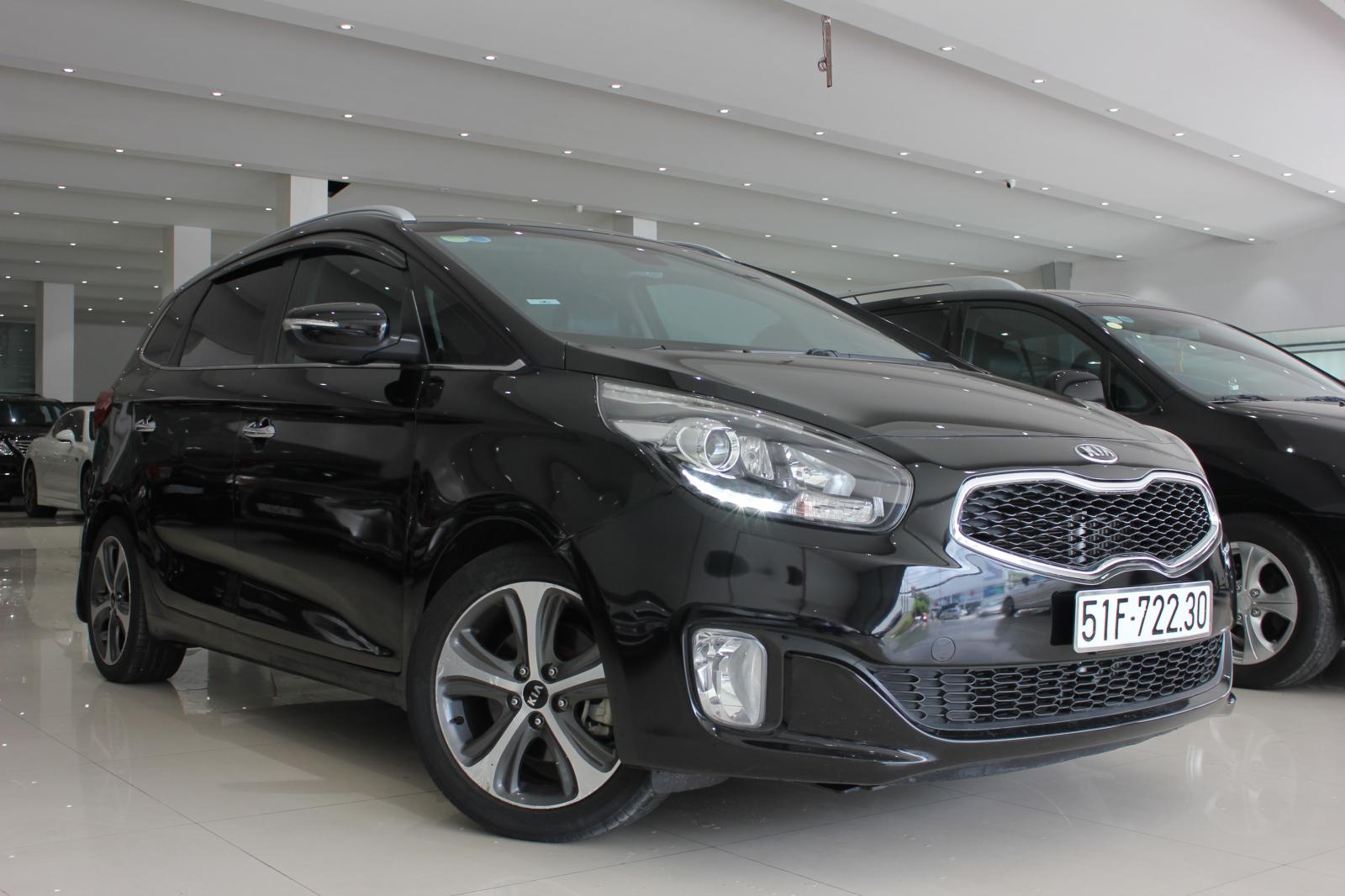 Kia Rondo 1.7 2016 - Cần bán Kia Rondo 2016 1.7 AT máy dầu, Odo: 35.000 km, màu đen đậm chất lịch lãm