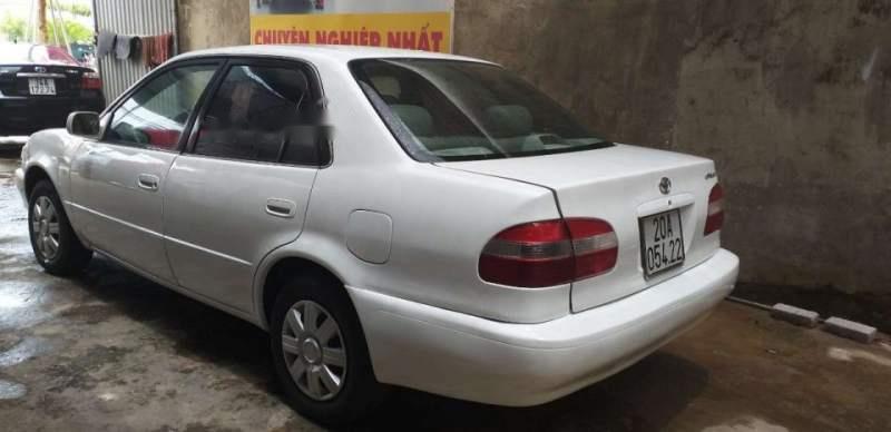 Toyota Corolla 2000 - Cần bán lại xe Toyota Corolla năm 2000, màu trắng