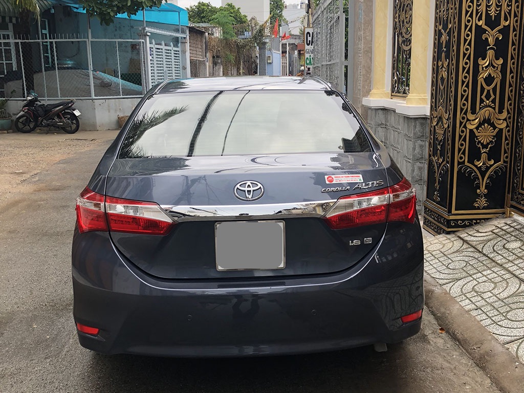 Toyota Corolla altis MT 2015 - Bán Toyota Altis 2015 số sàn, màu xanh rất đẹp