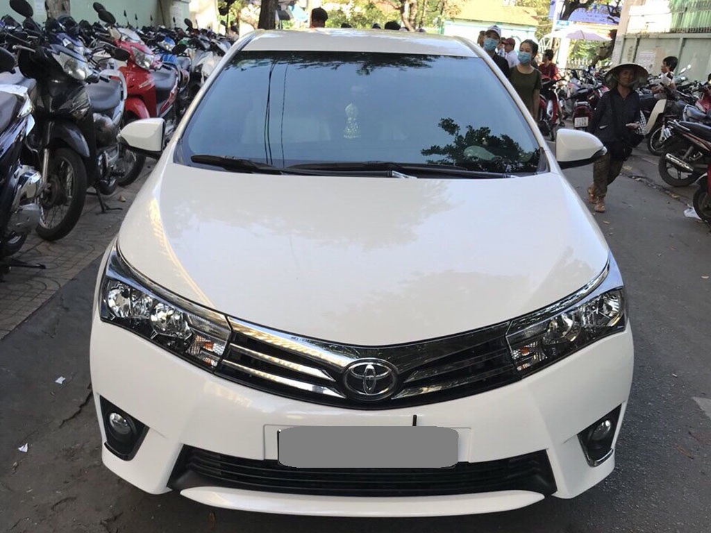 Toyota Corolla altis MT 2015 - Gia đình cần bán xe Altis 2015, số sàn, màu trắng