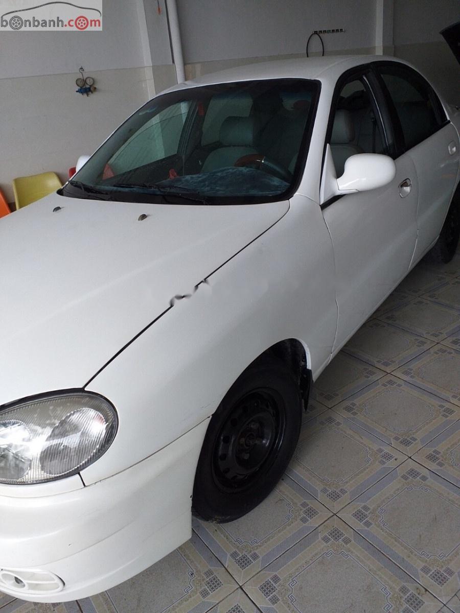 Daewoo Lanos 2002 - Cần bán gấp Daewoo Lanos đời 2002, màu trắng, xe nhập