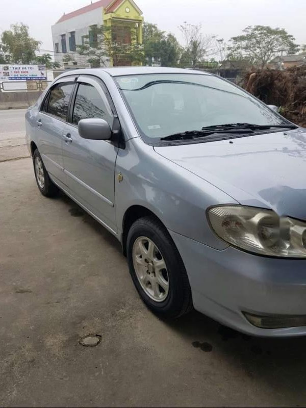 Toyota Corolla altis 2003 - Cần bán Toyota Corolla altis sản xuất 2003, màu bạc, giá chỉ 235 triệu